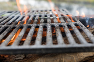 Close up of a grill with flames