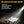 Load image into Gallery viewer, A close-up of a Grillight LED Spatula on a grill with burger patties