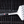 Load image into Gallery viewer, A Giant Edition Grillight LED Spatula laid on top of a grill